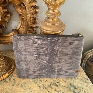 Kooba hand crafted Italian leather animal print clutch
